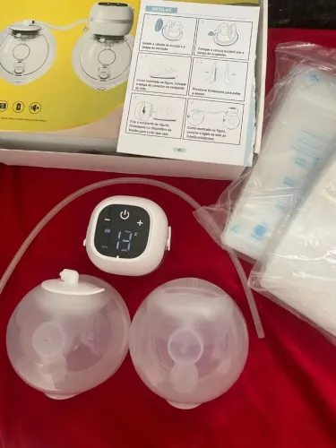 Extrator de leite materno