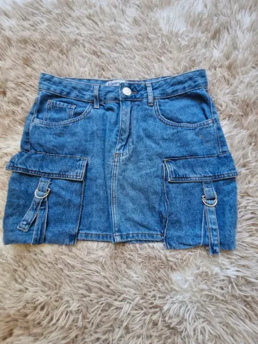 Saia  jeans com bolsos na lateral 