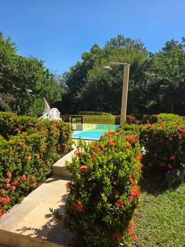 Aluga-se chácara no condomínio Monte Carlos, 1.625m² de área, casa 144m² de construção, 2