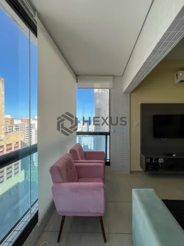 Flat reformado com varanda gourmet e lazer na Pitangueiras, Guarujá