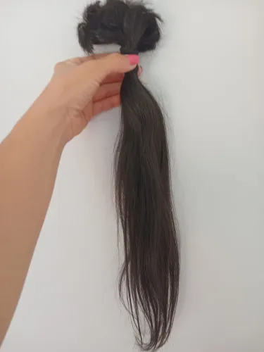 Cabelo humano brasileiro ondulado. 