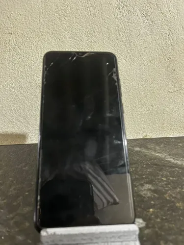 Vendo sansung Galaxy a04e com carregador com marcas de uso