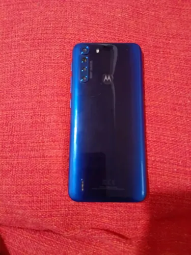 Vendo celular Motorola Fudion . Em perfeito estado com caixa e tido