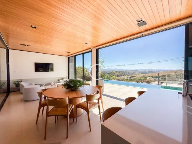 Sobrado com 5 suítes e piscina de borda infinita à venda, 408 m² por R$ 4.800.000 - Urbano