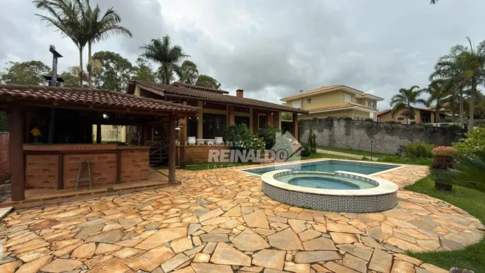 Casa com 5 dormitórios para alugar, 350 m² por R$ 10.480/mês - Condomínio Ville de Chamoni
