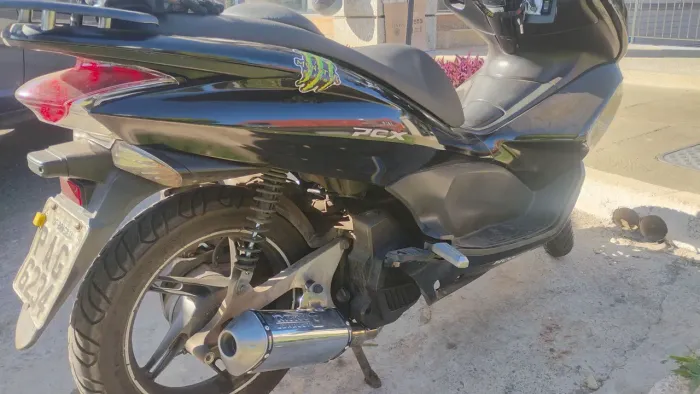 Escape esportivo pcx