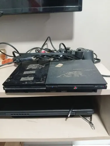 PlayStation 2, joystick e adaptador HDMI VGA