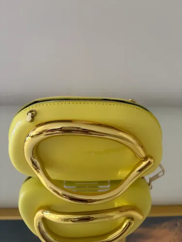 Clutch amarela 