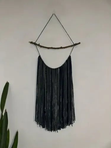 Decoração de parede artesanal em macramé