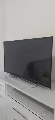 Vendo Tv e estante 