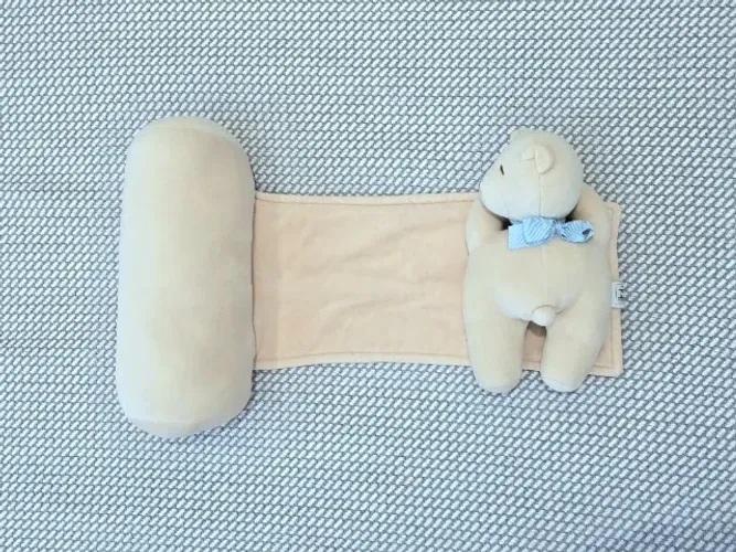Rolinho Segura Bebê - Urso Paola da Vinci - Bege Laço Azul