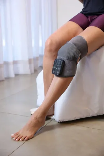 Joelheira Massageadora Térmica Vibratória Recarregável Ajuste de Intensidade
