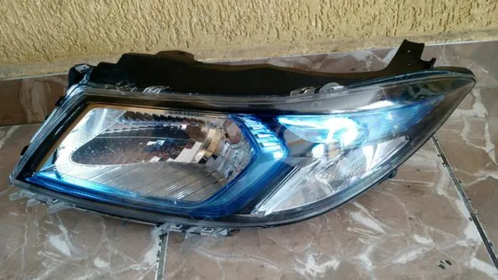 Farol esquerdo Chevrolet Onix Prisma Azul