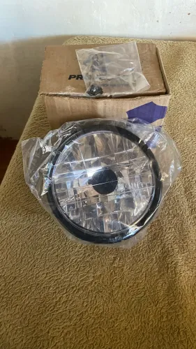 Vendo farou completo CG fan ou titan KS,ES novo na caixa