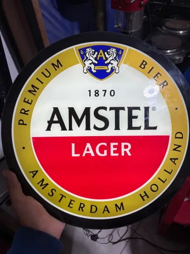 placa publicitária amstel
