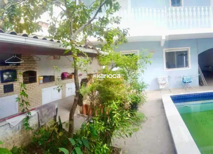Casa em Condomínio à venda em Taquara com 299m²
