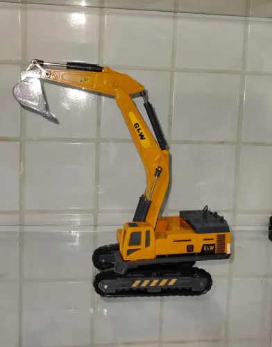Retroaescavadeira/ brinquedo de ferro
