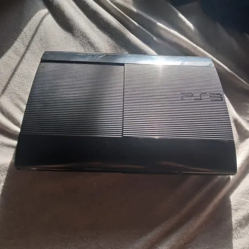 PS3 Super Slim + 2 Controles + Jogos no HD<br>R$ 650,00