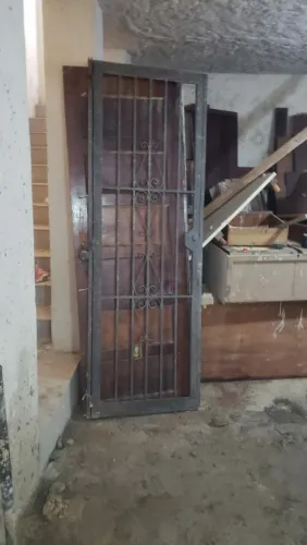 Porta de ferro 70x210 com chave completa