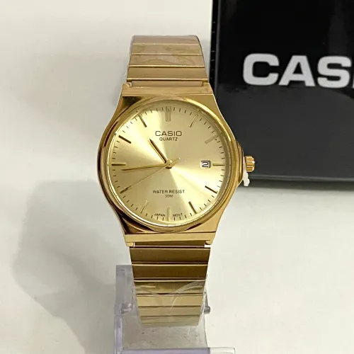 Relógio casio vintage analógico dourado + caixa 