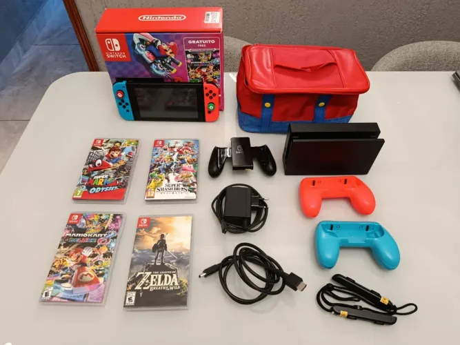 Nintendo Switch V2 na caixa mais acessórios e jogos!<br>