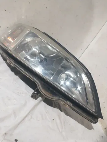 Farol direito gm/astra 2002 arteb 