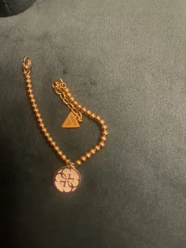 Pulseira GUESS  em aço banhada em ouro