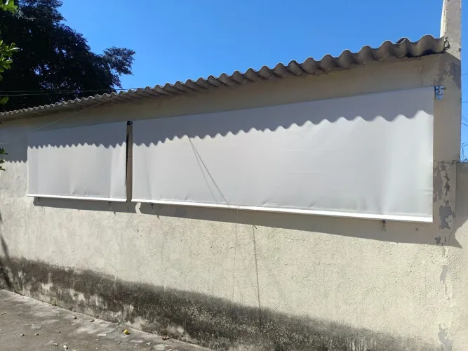 Toldos de mola em tela solar