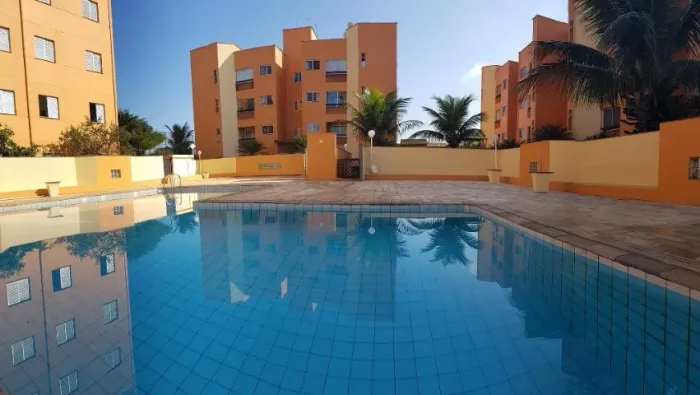 ÓTIMO APARTAMENTO NA PRAIA EM LINDO CONDOMÍNIO LADO PRAIA , LAZER COMPLETO COM PISCINAS