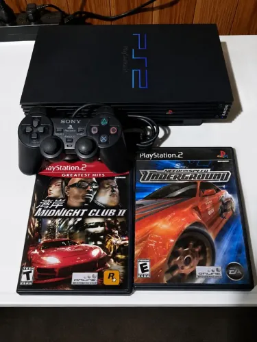 PlayStation 2 com controle original e 2 jogos originais também , leitor 100%