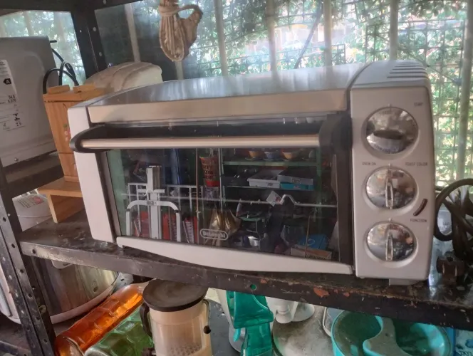 Forninho elétrico delonghi 