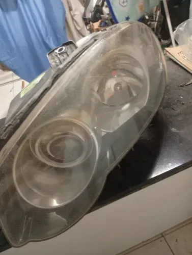 Farol lado esq/ palio