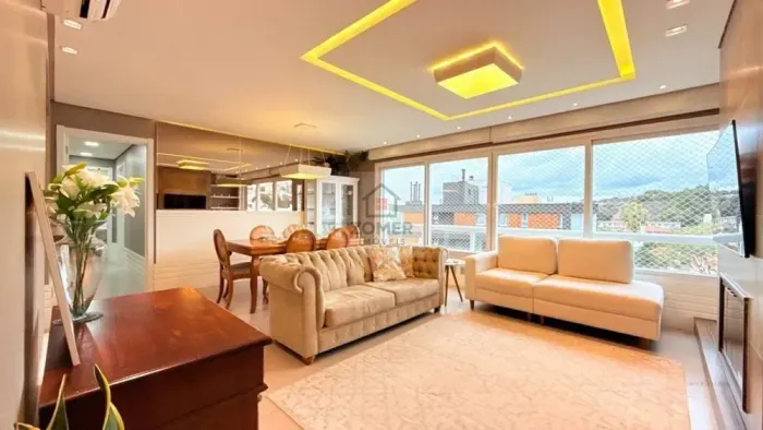 Apartamento com 3 quartos, 3 suítes e 128m² à venda em Menino Deus