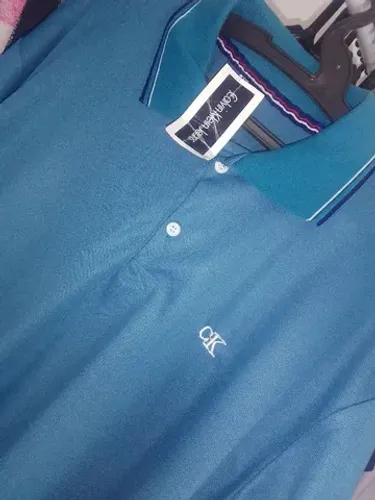 Camisa polo adulto 29.90$