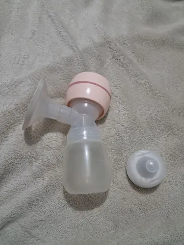 Vendo bomba extratora elétrica 9 modos, em ótimo estado, acompanhada da mamadeira 