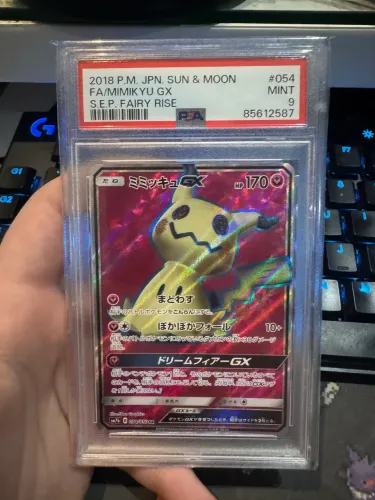 Carta Mimikyu Pokémon Graduada