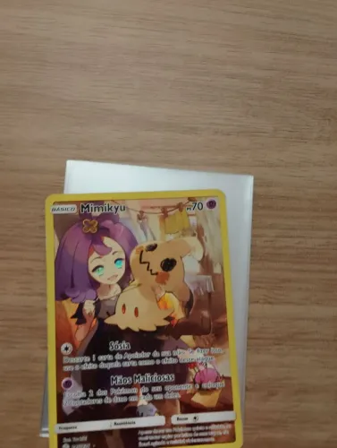 Mimikyu com danos no verso da carta