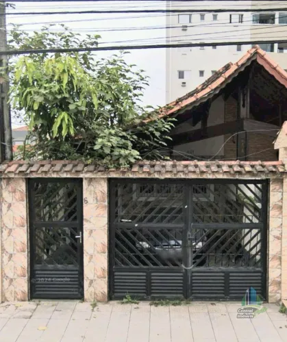 Casa com 3 dormitórios à venda, 144 m² por R$ 720.000 - Vila Guilhermina - Praia Grande/SP