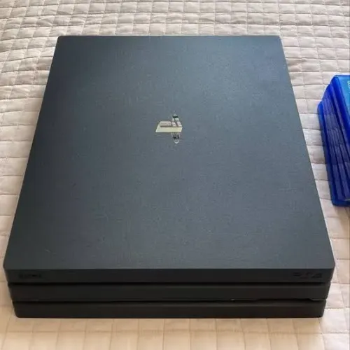Playstation pro 1 tb semi-novo na caixa