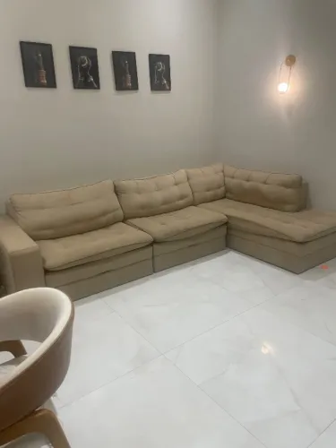 Sofá em L retrátil