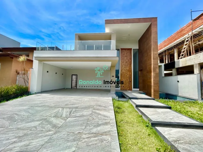 Belíssima Casa De Alto Padrão em Condomínio Fechado com 4 suítes em Bertioga - SP, no bair