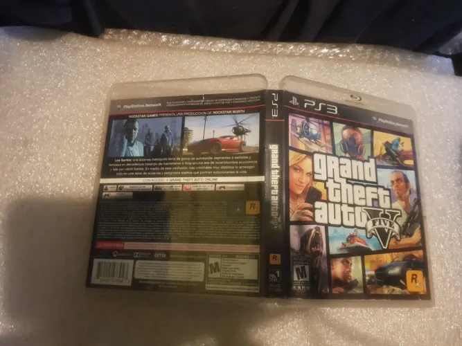 Vendo Jogos de PS3 dois Discos de GTA e um Disco do Jogo Watch Dogs