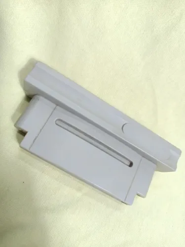 Adaptador para rodar cartuchos do  Super Nintendo no Super famicom