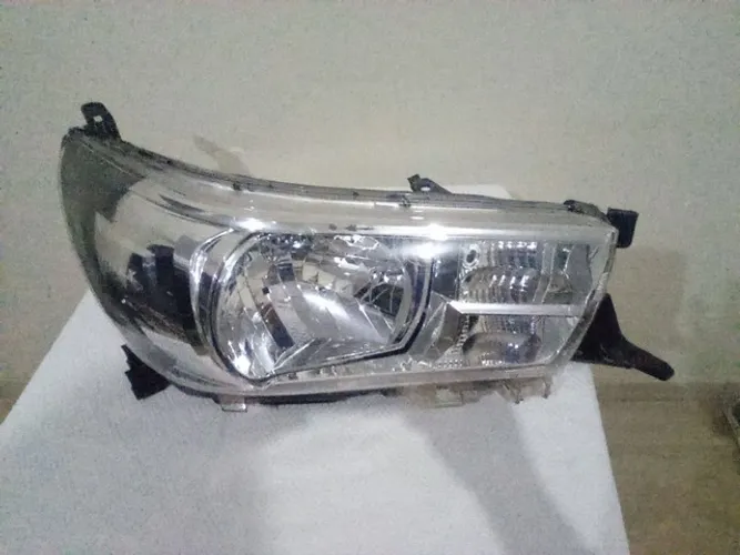 Farol Hilux 2016 até 2020 s/ led LD