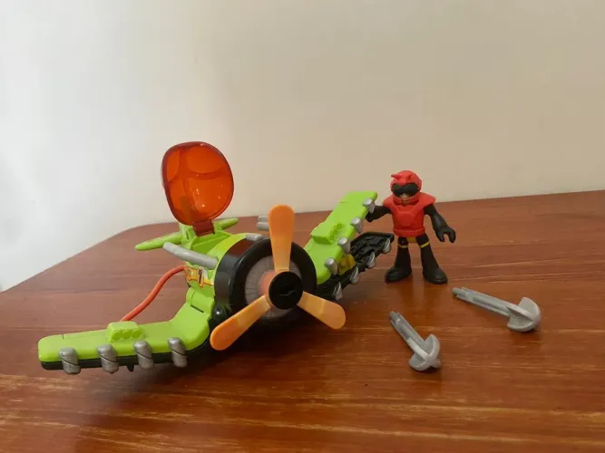Avião Sky Racer verde, preto e vermelho. Imaginext Fisher Price - Mattel<br>