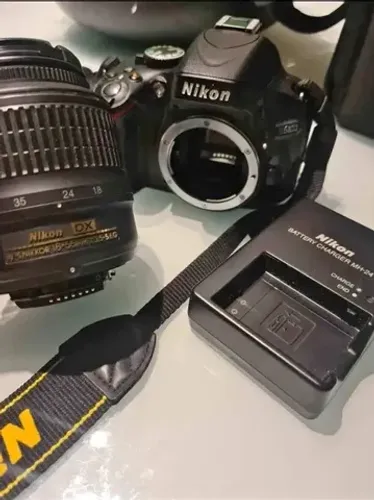 Camera nikon D5.100 aceito cartão