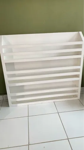 Porta livros parede