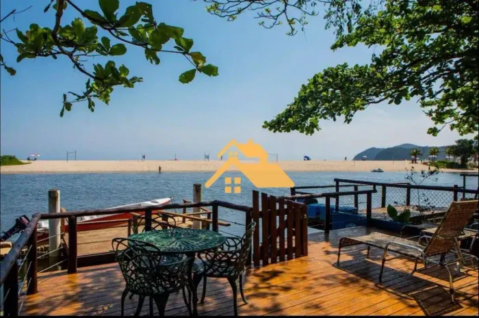 Paraíso à Beira do Rio Una: Casa com Vista para o Mar, Deck Privativo e Acesso Náutico em