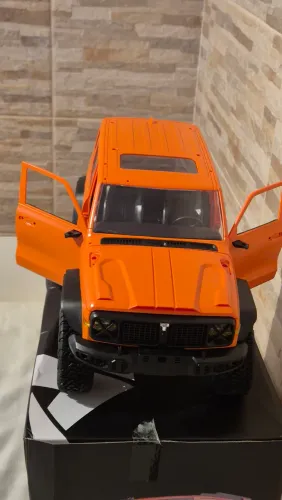 Automodelo rc crawler MN300 laranja 1/12 leds