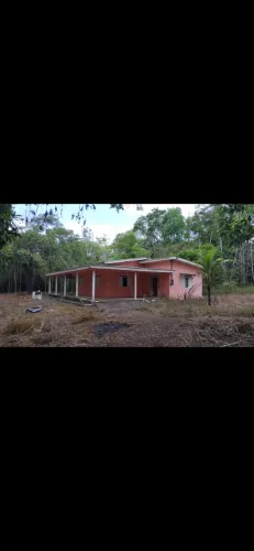 Terreno com casa passando a ponte do Matapi